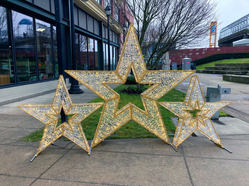 2022 Holiday Decorations from HolidayLights.com 5 Pointed Stars Cluster of Three Life-sized Display Lit with White LED Bulbs and Handcrafted Gold Frame